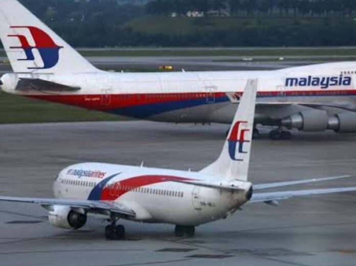 MH370 Pilot's Murder-Suicide Plot Entombs Plane in Trench