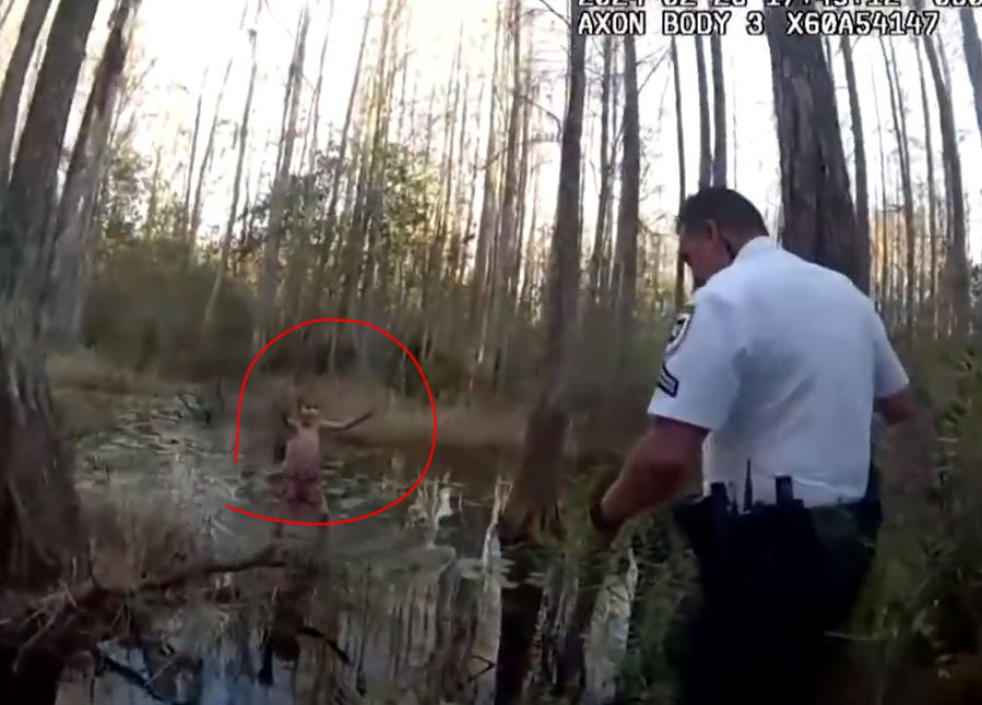 Bodycam footage of deputies carefully rescuing a young girl from a swamp.